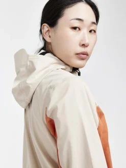 Women Craft Sportswear Women's ADV Essence Hydro Jacket - Rusty Glow/Ecru